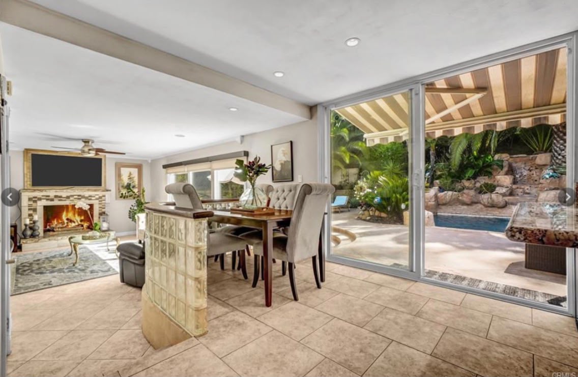 Dining room opening to backyard