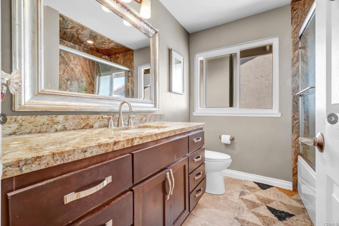 Updated bathroom with granite vanity